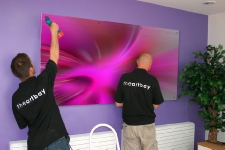 Video footage of an installation of Theartbay's corporate art